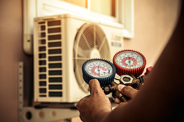 Professional Heat Pump Repair technician working in New Castle, KY